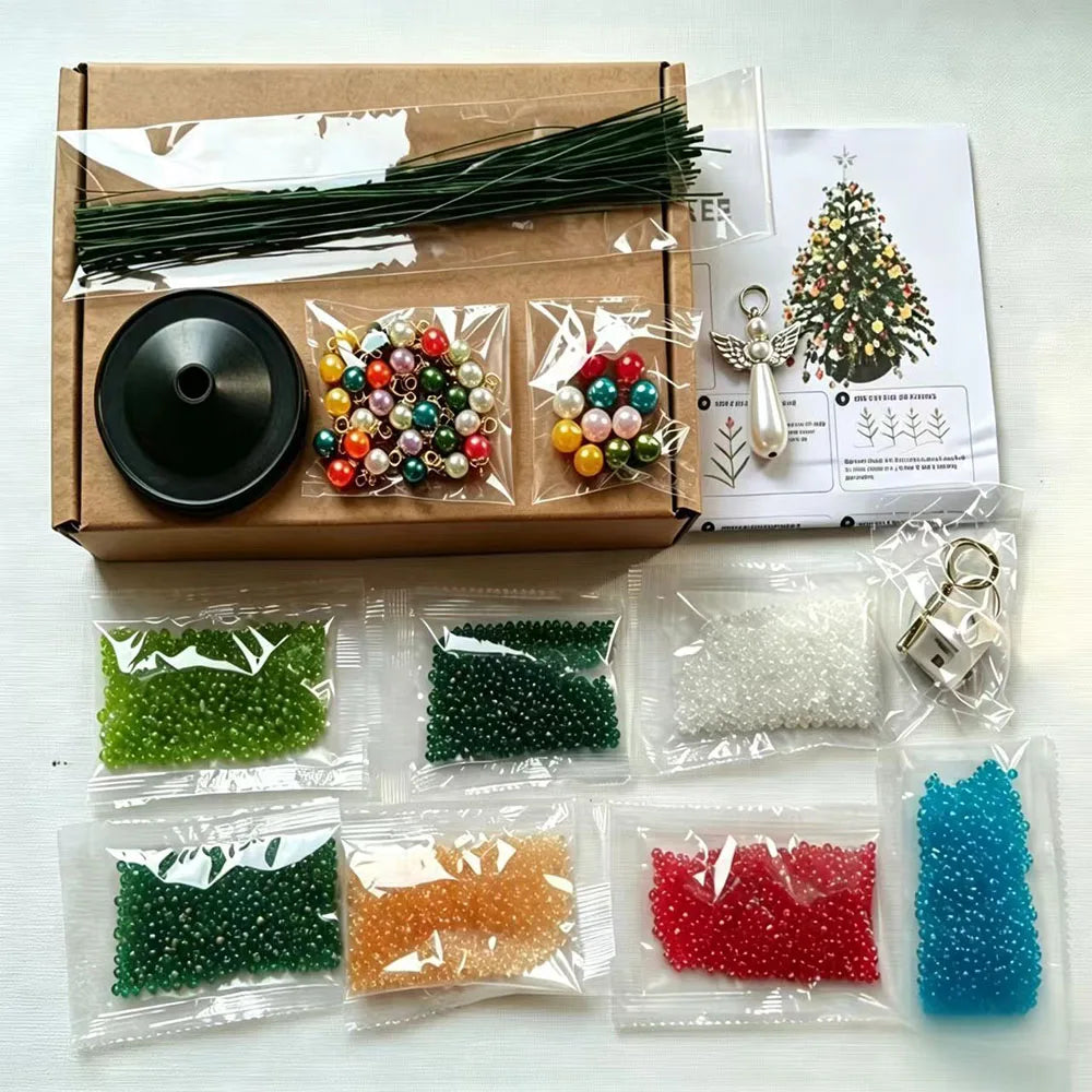 What you actually get: bagged glass seed beads, green wire, ornament charms, angel topper, base and instructions